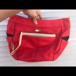 A red Demi Miche bag brand new never used